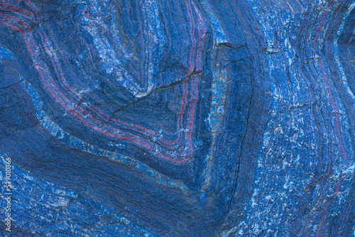 Tableau sur toile The texture of an iron ore mineral rock, a type of iron ore with impurities
