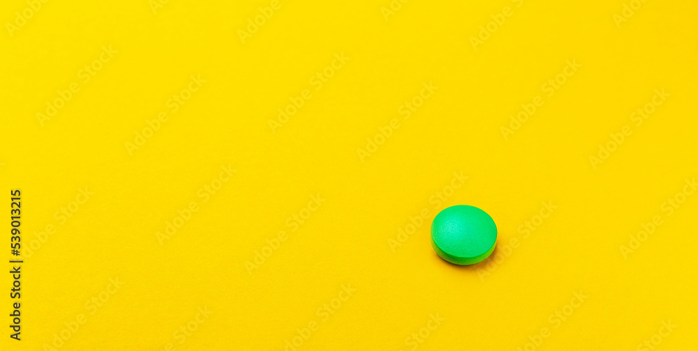 medical pills close-up on a yellow background medical pills close-up on a yellow background