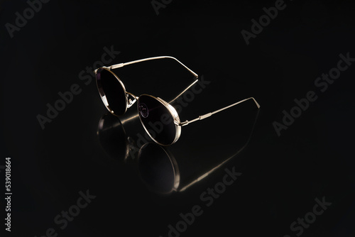  Glasses on a black background. Selective focus.