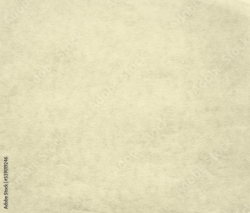 Blank page with high quality cotton paper texture. Light yellow color closeup copyspace.