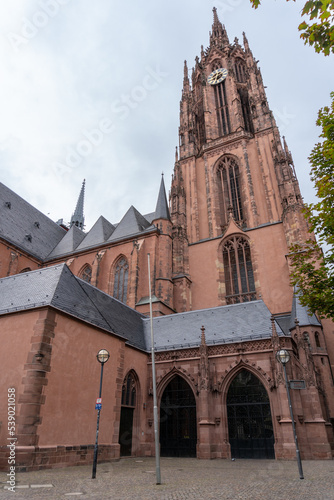 Bell tower of the cathedral of the city of Frankfurt, on a cloudy day.