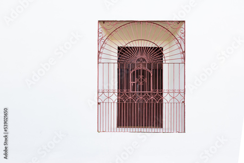 Fotografi Detalle de la reja que protege una ventana en la Basílica de la ciudad de El Viejo