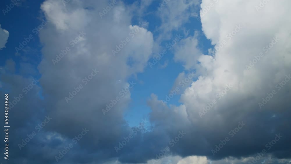 Dark rain clouds filling the sky. The weather is changing fast from partly cloudy to dramatic overcast. Thunderstorm clouds in a time lapse video. The environment disappears in deep darkness. Dark rain clouds filling the sky. The weather is changing fast from partly cloudy to dramatic overcast. Thunderstorm clouds in a time lapse video. The environment disappears in deep darkness.