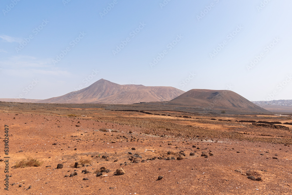 Desert landscape with mountains terraine. Caldera of an ancient volcano. Desert landscape with mountains terraine. Caldera of an ancient volcano.