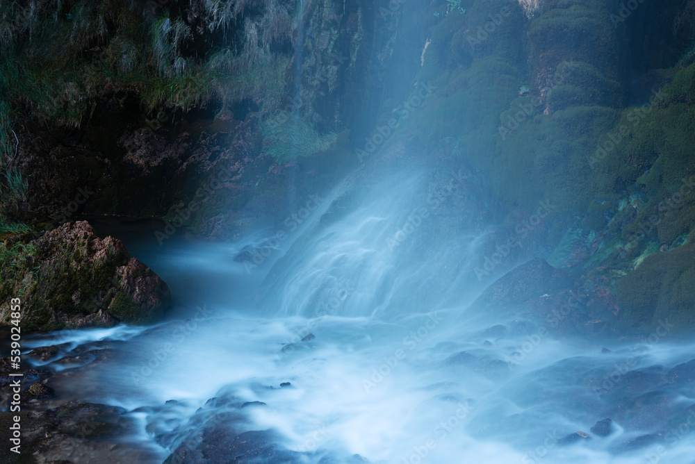 Waterfall of the Molino de la Chorrera in Cuenca mountain range natural park, Spain - long exposure view