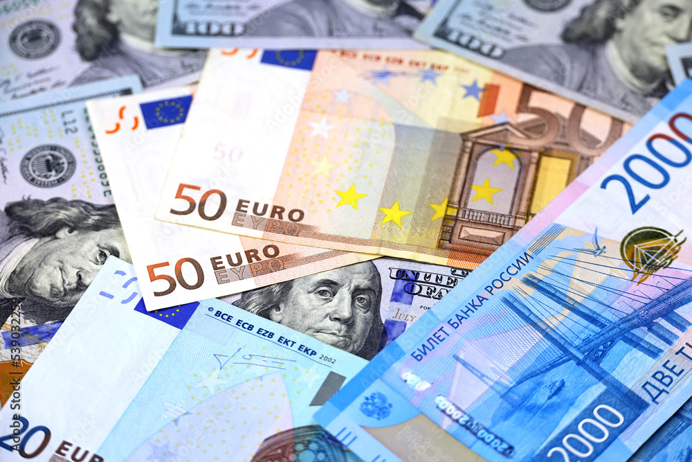 US dollars, Russian rubles and Euro banknotes. American and european economic, sanctions against Russia, exchange rate US dollars, Russian rubles and Euro banknotes. American and european economic, sanctions against Russia, exchange rate