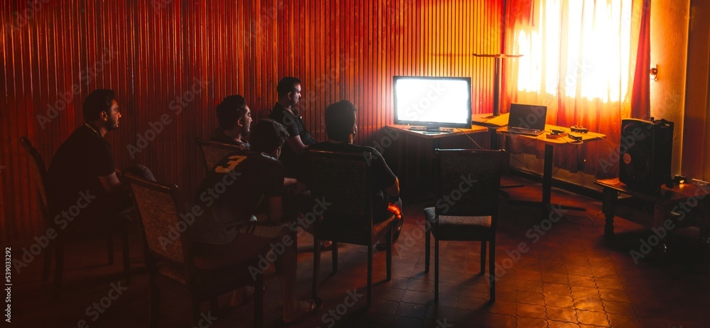 People watching TV together.