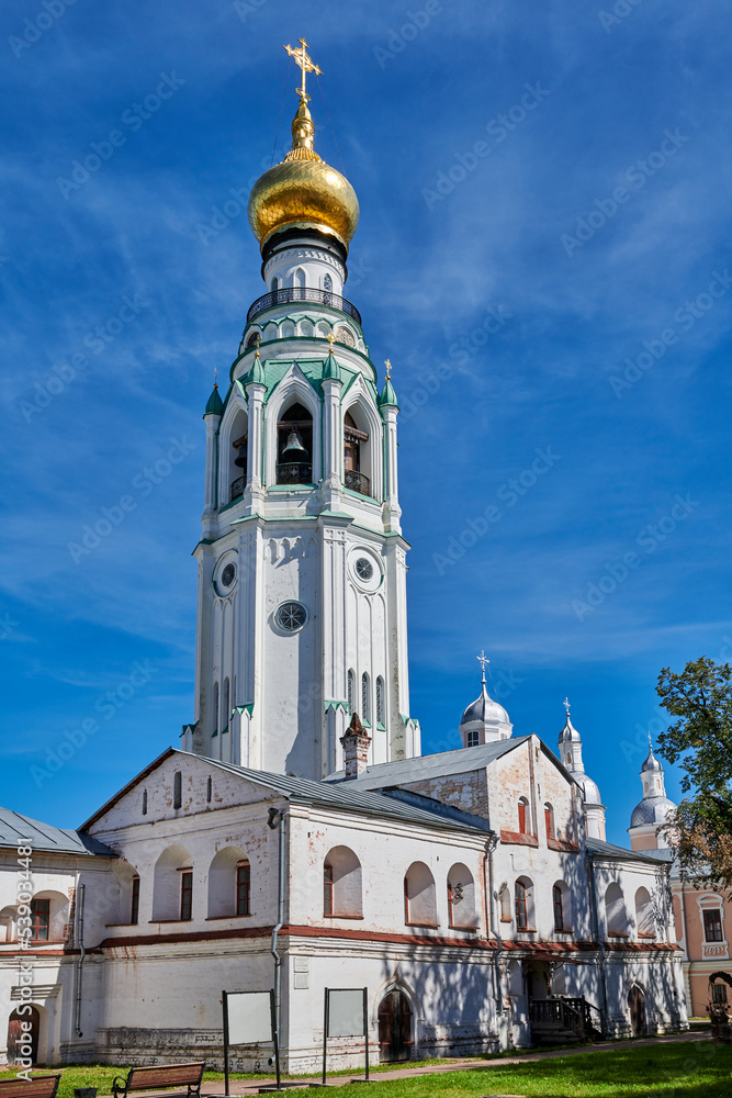 Russia. City of Vologda. Kremlin. The bell tower of St. Sophia Cathedral behind the economic building
