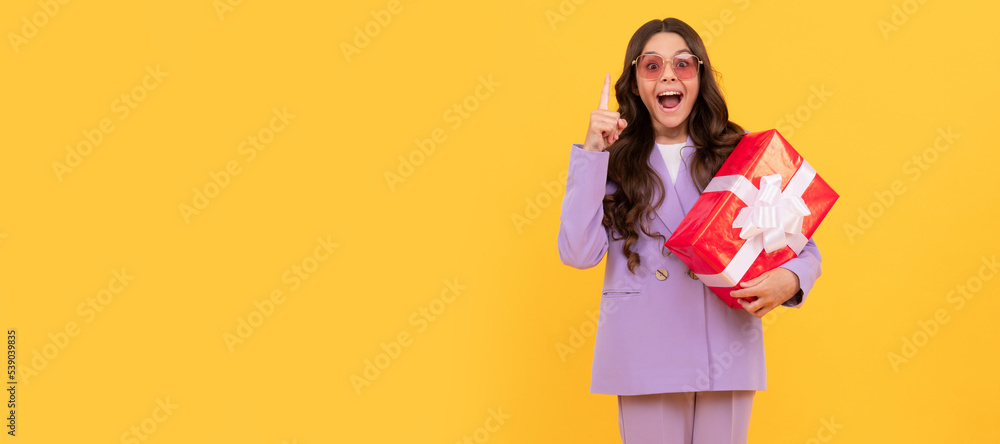 trendy inspired with idea teen girl in sunglasses and suit hold present box full length, inspiration. Kid girl with gift, horizontal poster. Banner header with copy space. trendy inspired with idea teen girl in sunglasses and suit hold present box full length, inspiration. Kid girl with gift, horizontal poster. Banner header with copy space.