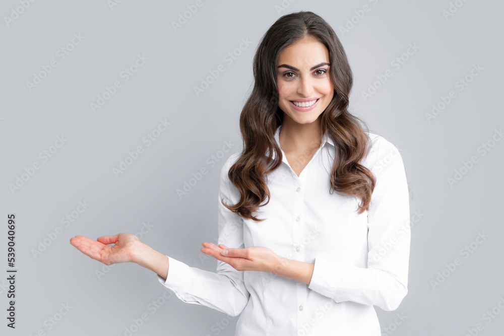 Woman point at copy space, showing copyspace pointing. Promo, girl showing advertisement content gesture, pointing with hand recommend product. Isolated background. Woman point at copy space, showing copyspace pointing. Promo, girl showing advertisement content gesture, pointing with hand recommend product. Isolated background.