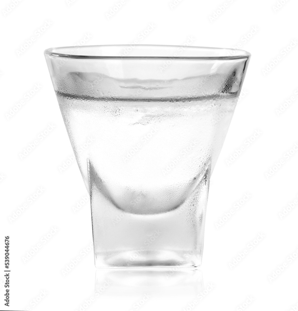 Shot glass of vodka on white background. Alcoholic drink Shot glass of vodka on white background. Alcoholic drink
