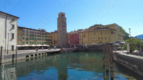 View of the historic city center near the port, with its colorful houses, hotels and its watchtower on a summer day