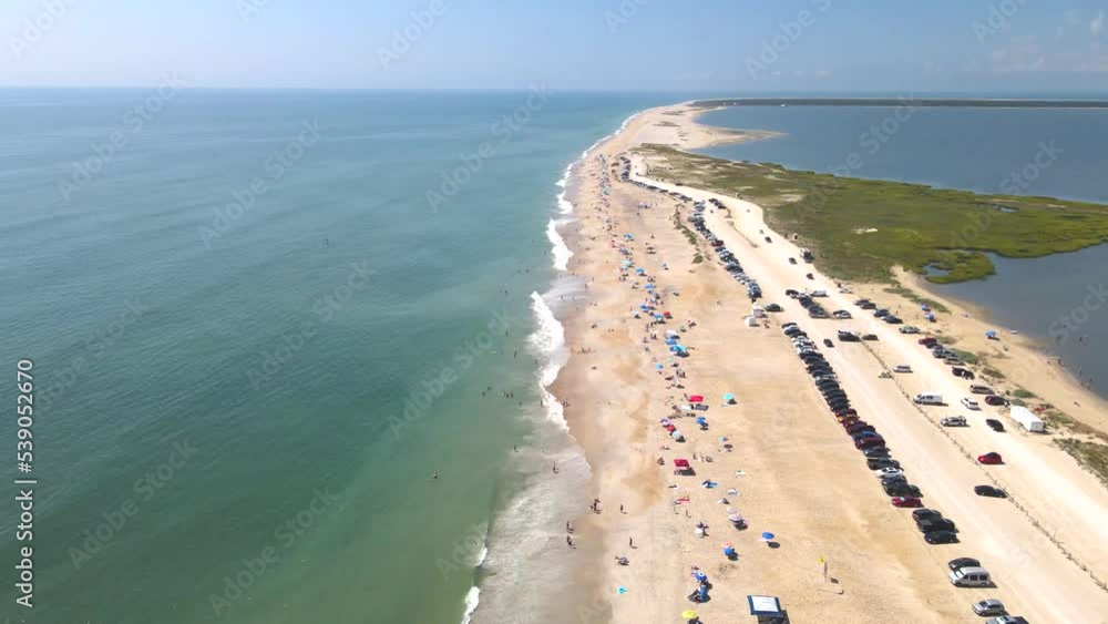 Top down view of the beach on Chincoteague Island Virginia. car parking on the beach along the