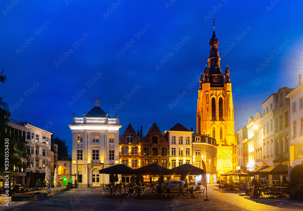 Twilight photo of Saint Martin's Church in Kortrijk, view from Central Square. Belgium, Flemish province of West Flanders.