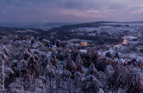 Winter aerial view of Tisa village from Tiske steny rocks, Czech Republic photo