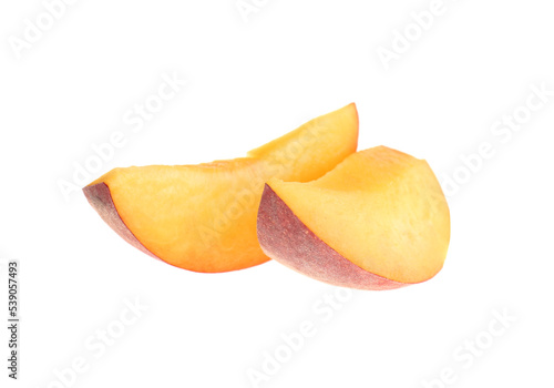 Slices of ripe peach isolated on white