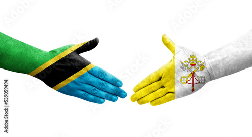 Handshake between Holy See and Tanzania flags painted on hands, isolated transparent image.