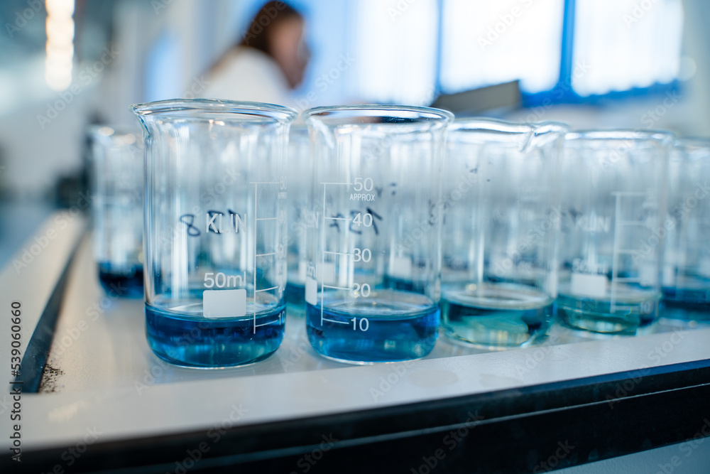 Laboratory for analysis of flasks with blue liquid a lot Laboratory for analysis of flasks with blue liquid a lot