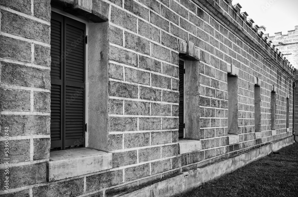 Old Stone Block Building Side View in Black and White. Old Stone Block Building Side View in Black and White.