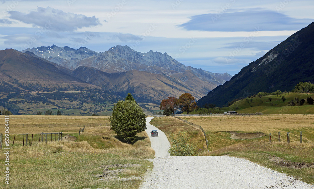 Naklejka premium Dirt road in Southern Alps, New Zealand