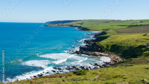 a peaceful sea view of the coast of victor harbor in summer of South Australia with crystal blue water and green landscape 