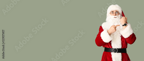 Surprised man in Santa cost...