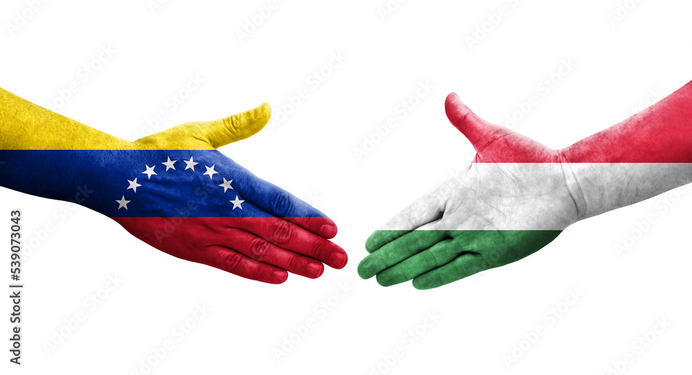Handshake between Hungary and Venezuela flags painted on hands, isolated transparent image.
