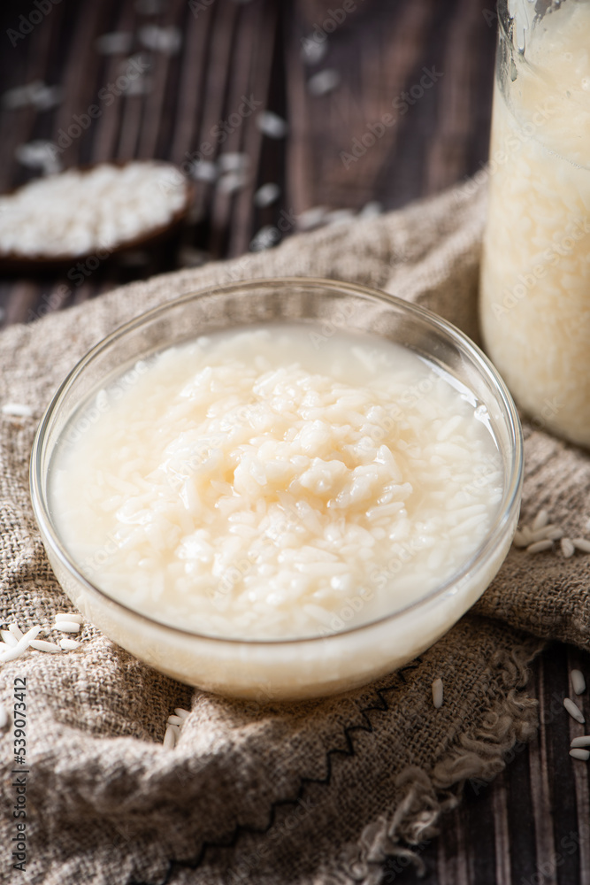 Delicious fermented glutinous rice wine on table Delicious fermented glutinous rice wine on table