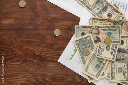 Dollar banknotes with coins...