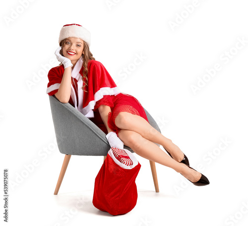 Young woman in Santa costum...