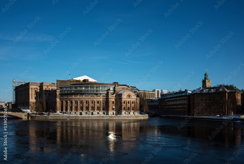 Swedish Parliament House a sunny snowy winter evening in Stockholm