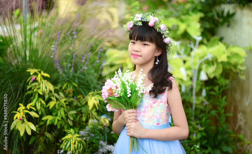 beautiful asian flower girl holding flowers beautiful asian flower girl holding flowers