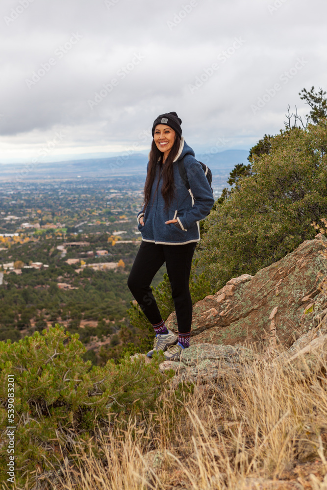 Naklejka premium Woman hiking in Santa Fe, New Mexico
