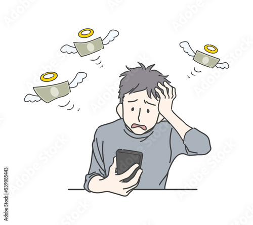 スマホを手に持って散財に頭を抱える若い男性