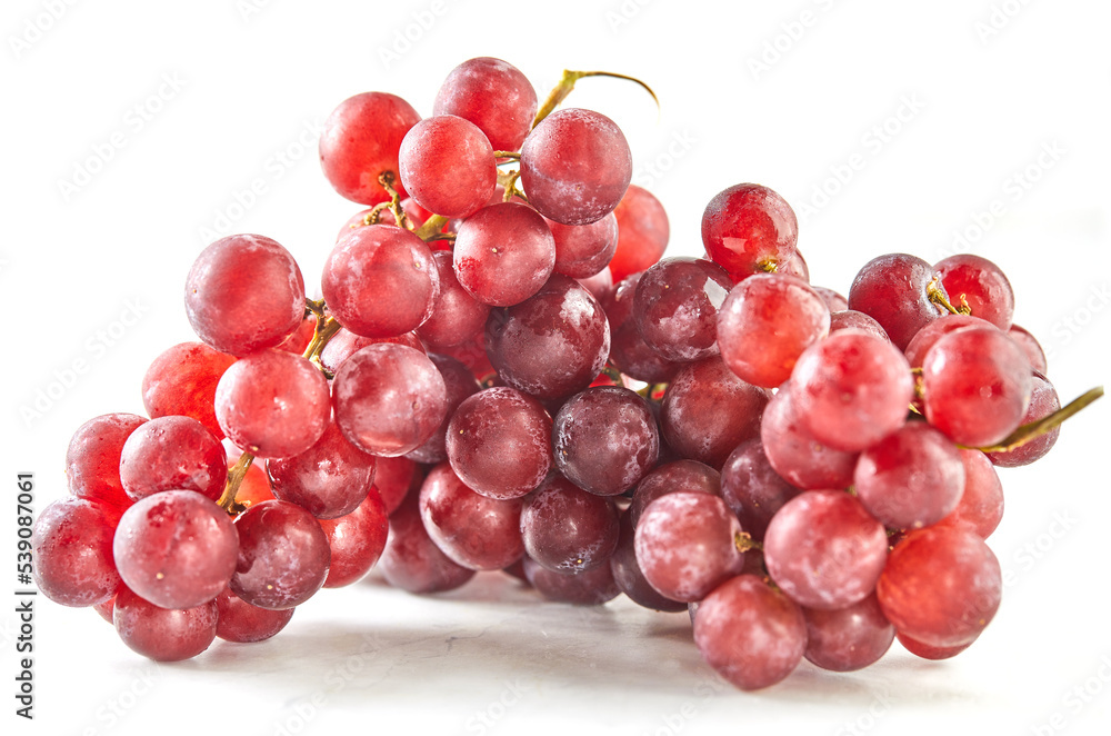 Red grapes on white marble, ready to cook and eat Red grapes on white marble, ready to cook and eat