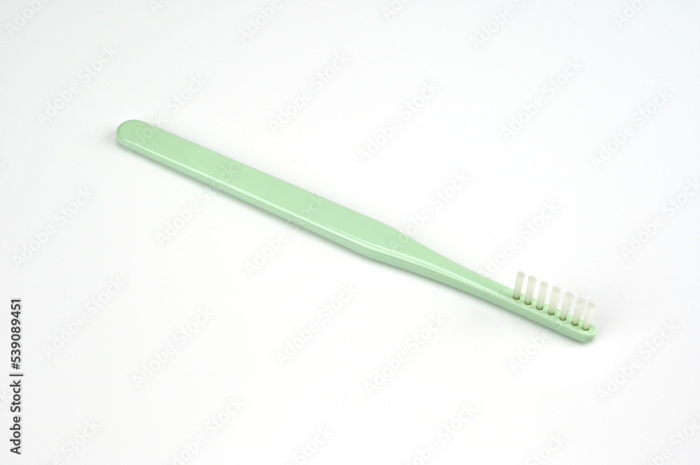 One row of green brushes for teeth One row of green brushes for teeth