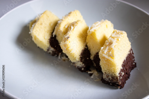 sweet vanilla and chocolate cake with cheese topping. looks so delicious
