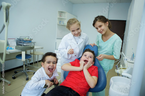 Playing dentist in the dental office.