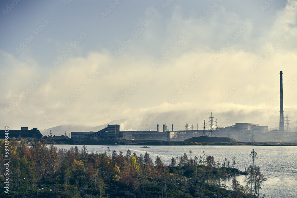 Industrial landscape with heavy pollution produced by a large factory.
