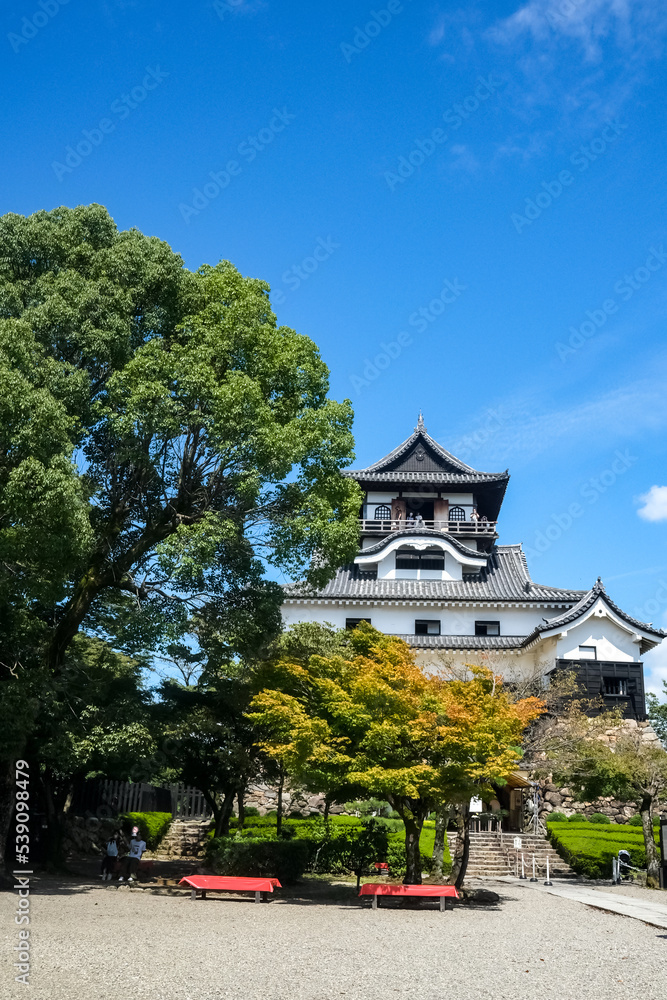 Aichi, Japan - September 10 2022: Scenery of Inuyama Castle, national historic site at summer with blue sky background, built in 1937 by Oda Hirochika.