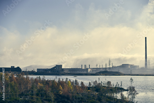 Fototapeta Naklejka Na Ścianę i Meble -  Industrial landscape with heavy pollution produced by a large factory.