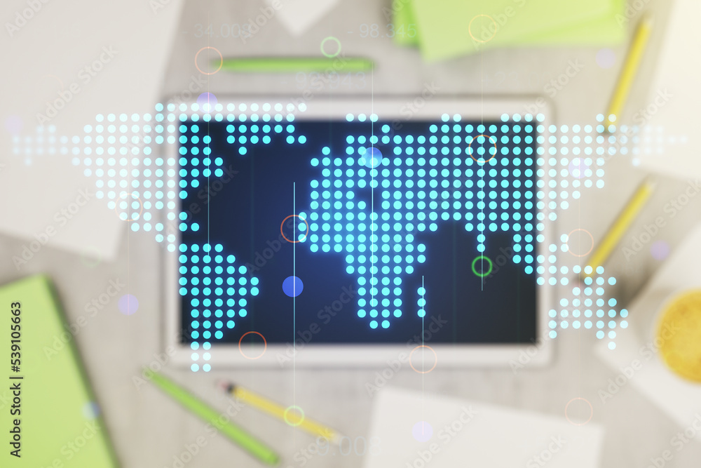 Double exposure of abstract digital world map and digital tablet on background, top view, research and strategy concept Double exposure of abstract digital world map and digital tablet on background, top view, research and strategy concept
