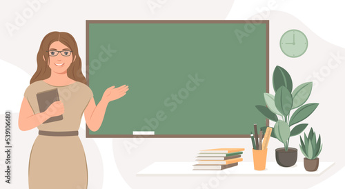 Female teacher in classroom. Woman teacher standing by blackboard in the classroom. Concept of education and training. Vector illustration
