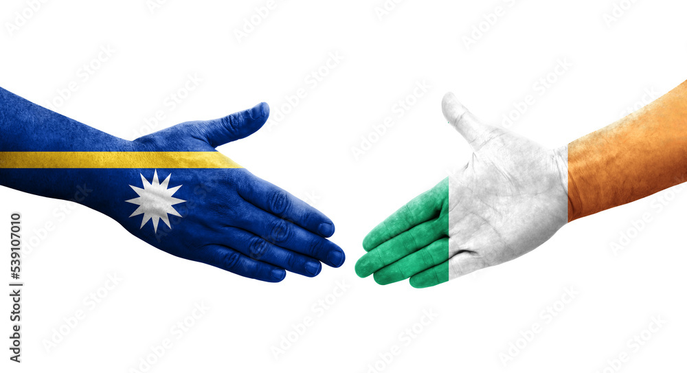 Handshake between Ireland and Nauru flags painted on hands, isolated transparent image. Handshake between Ireland and Nauru flags painted on hands, isolated transparent image.