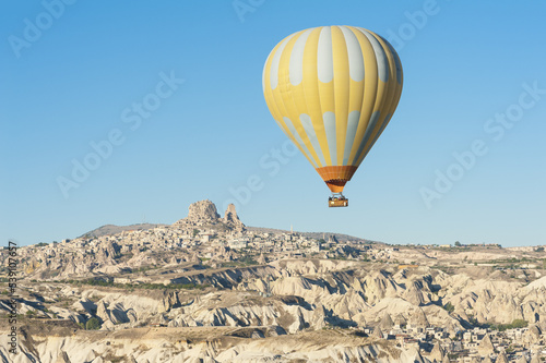 Hot Balloon over morning Uchisar in Turkey