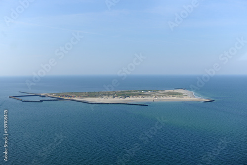 Drone viewpoint of beautiful Helgoland amidst sea against blue sky