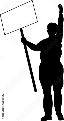 Protestor or demonstrator at a demonstration march, picket line or strike protest rally in silhouette. Holding up a banner or picket sign board placard.