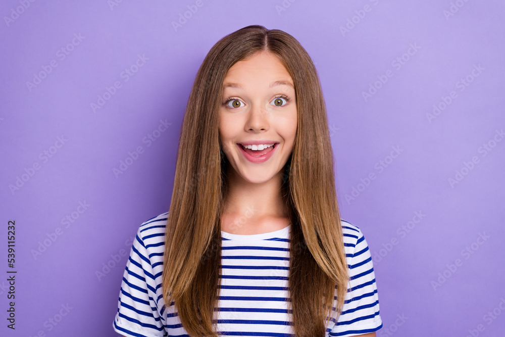 Photo of impressed excited positive girl with straight hairdo dressed striped t-shirt open mouth isolated on purple color background
