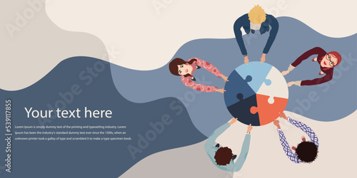 Group of business men and women top view holding and joining jigsaw puzzle pieces. Colleagues of diverse ethnic groups and cultures. collaborate - cooperate. Teamwork. Banner template