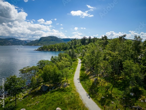 High-level view over the Jorpeland Holmen Island in Norway. Road curving over the island to fjord. photo